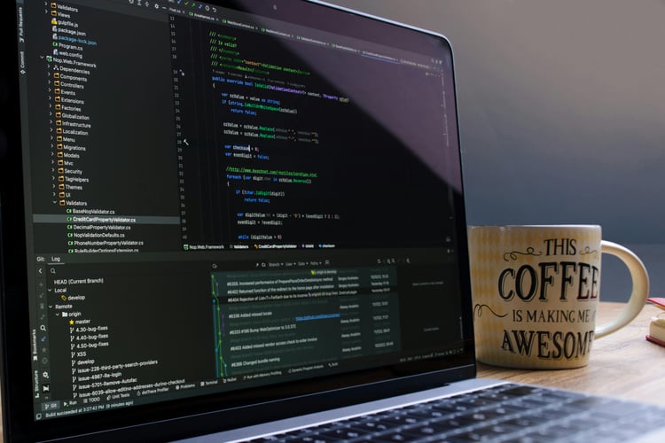 Photo by Daniil Komov: https://www.pexels.com/photo/laptop-with-coding-software-and-coffee-mug-34803973/